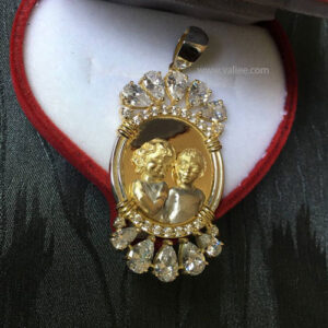 18k gold Victorian-style pendant with twin portraits, diamond accents, and engraved details, handcrafted by Mehdi Valiee
