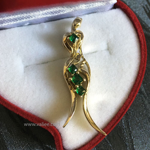 18k gold sculptural pendant with emeralds, transforming the name Mehrnoosh into wearable form, designed by Mehdi Valiee